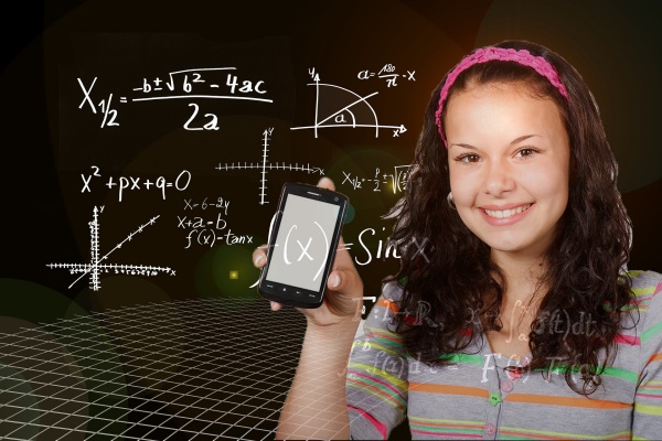 smiling girl and algebra formulas